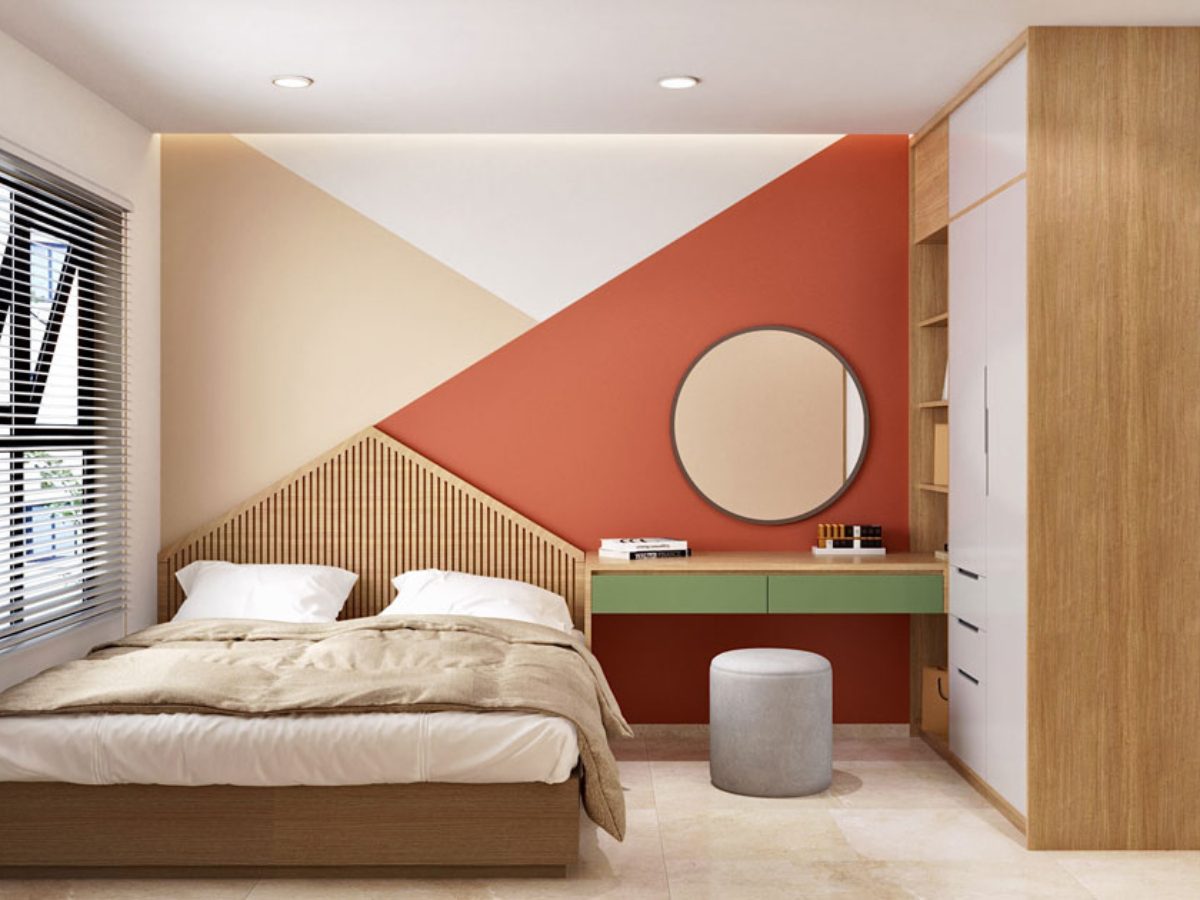 okking.con color block kết hợp mảng màu cam, trắng, be cùng với nội thất màu gỗ ấm cúng