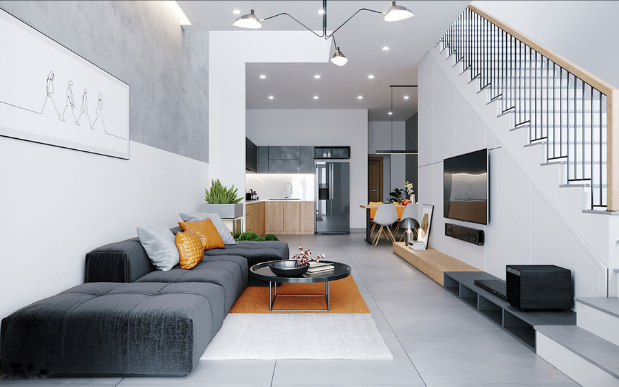 Bạn nên tận dụng vị trí độc đáo của cầu thang để tạo điểm nhấn cho phòng khách