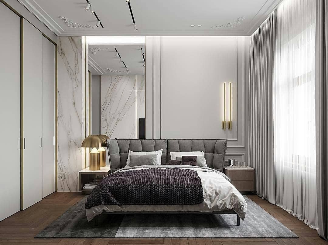 Giường ngủ lớn kết hợp với tủ quần áo âm tường và bàn trang điểm nhỏ gọn giúp tiết kiệm diện tích (Nguồn: Sưu tầm)